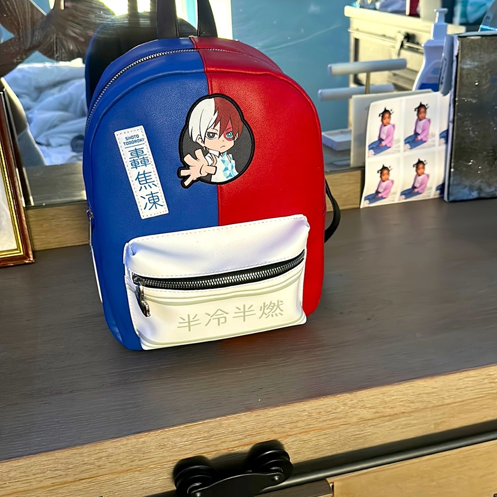 Med. Size Anime backpack, with black straps